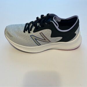 New Balance Women's Black and White Sneakers